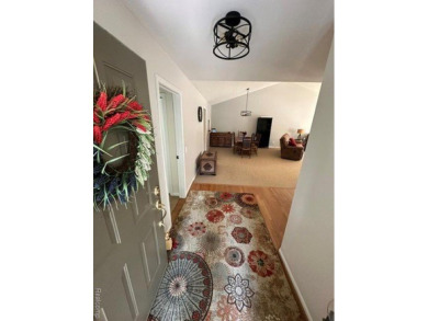 Welcome to your dream home in one of Northville's most coveted on Bushwood Golf Club in Michigan - for sale on GolfHomes.com, golf home, golf lot