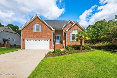 Welcome to this stunning brick and vinyl home nestled in the on Harbour Point Golf Club in North Carolina - for sale on GolfHomes.com, golf home, golf lot