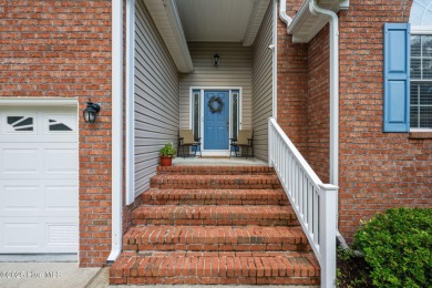 Welcome to this stunning brick and vinyl home nestled in the on Harbour Point Golf Club in North Carolina - for sale on GolfHomes.com, golf home, golf lot
