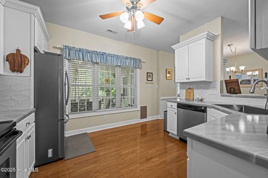 Welcome to this stunning brick and vinyl home nestled in the on Harbour Point Golf Club in North Carolina - for sale on GolfHomes.com, golf home, golf lot