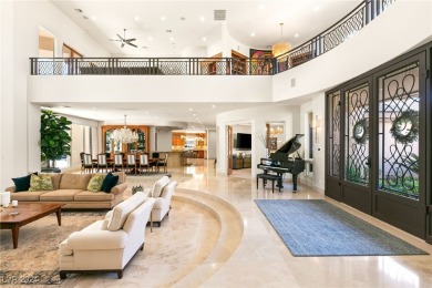 Experience luxury living in this palatial estate with over an on Southern Highlands Golf Club in Nevada - for sale on GolfHomes.com, golf home, golf lot