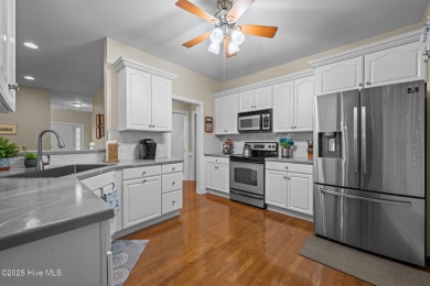 Welcome to this stunning brick and vinyl home nestled in the on Harbour Point Golf Club in North Carolina - for sale on GolfHomes.com, golf home, golf lot