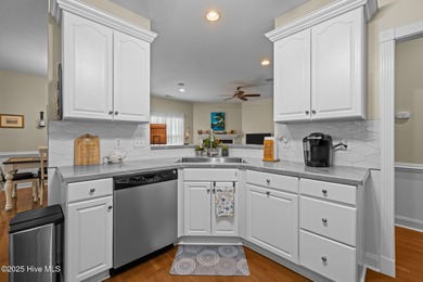 Welcome to this stunning brick and vinyl home nestled in the on Harbour Point Golf Club in North Carolina - for sale on GolfHomes.com, golf home, golf lot