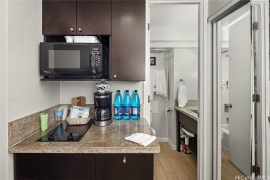 Furnished studio with 2 beds and kitchenette, large lanai with on Ala Wai Golf Course in Hawaii - for sale on GolfHomes.com, golf home, golf lot