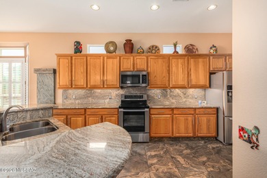 Extended Portland model with many upgrades- extended on Heritage Highlands At Dove Mountain in Arizona - for sale on GolfHomes.com, golf home, golf lot