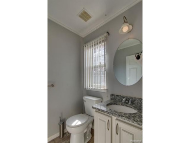 This beautifully updated home on a premium water view lot on Gateway Golf Club in Michigan - for sale on GolfHomes.com, golf home, golf lot