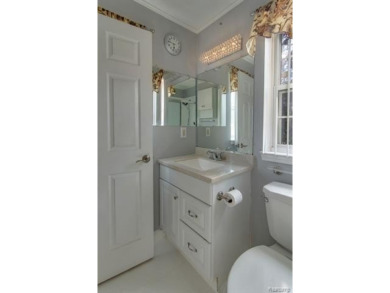 This beautifully updated home on a premium water view lot on Gateway Golf Club in Michigan - for sale on GolfHomes.com, golf home, golf lot