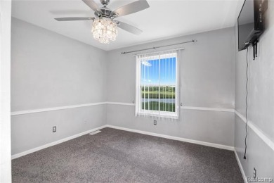 This beautifully updated home on a premium water view lot on Gateway Golf Club in Michigan - for sale on GolfHomes.com, golf home, golf lot