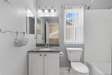 This beautifully updated home on a premium water view lot on Gateway Golf Club in Michigan - for sale on GolfHomes.com, golf home, golf lot