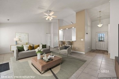 Welcome to 871 Falcon Glen Drive, a charming single-family home on Falcon Ridge Golf Course in Nevada - for sale on GolfHomes.com, golf home, golf lot