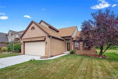 This beautifully updated home on a premium water view lot on Gateway Golf Club in Michigan - for sale on GolfHomes.com, golf home, golf lot