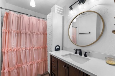 Welcome to this beautifully updated home nestled on a level on Bella Vista Country Club - Berksdale in Arkansas - for sale on GolfHomes.com, golf home, golf lot