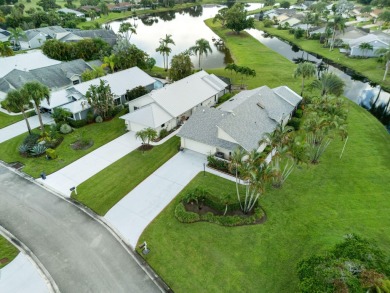 Enjoy peaceful lake views from this well-maintained 3-bedroom on Heritage Ridge Golf Club in Florida - for sale on GolfHomes.com, golf home, golf lot