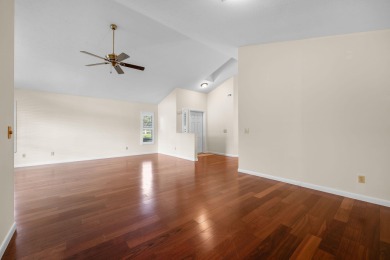 Enjoy peaceful lake views from this well-maintained 3-bedroom on Heritage Ridge Golf Club in Florida - for sale on GolfHomes.com, golf home, golf lot