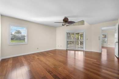 Enjoy peaceful lake views from this well-maintained 3-bedroom on Heritage Ridge Golf Club in Florida - for sale on GolfHomes.com, golf home, golf lot