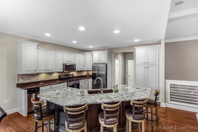 Welcome to Country Club Cove Villas, where maintenance-free on Seasons Ridge At Four Seasons in Missouri - for sale on GolfHomes.com, golf home, golf lot