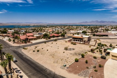 This remarkable corner lot boasts a captivating view of a on London Bridge Golf Course in Arizona - for sale on GolfHomes.com, golf home, golf lot