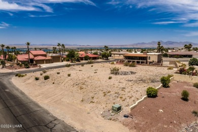 This remarkable corner lot boasts a captivating view of a on London Bridge Golf Course in Arizona - for sale on GolfHomes.com, golf home, golf lot