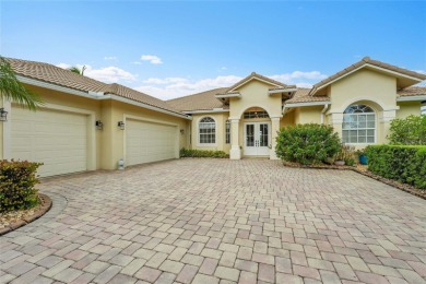 Stunning solid block construction home features a split floor on Meadowood Golf and Tennis Club in Florida - for sale on GolfHomes.com, golf home, golf lot