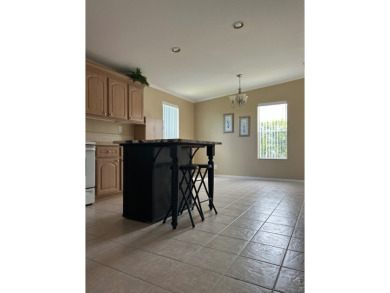 GORGEOUS OPEN AND SPLIT FLOOR PLAN HOME WITH TRAY CEILINGS AND on Silver Dollar Golf and Trap Club in Florida - for sale on GolfHomes.com, golf home, golf lot
