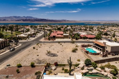 This remarkable corner lot boasts a captivating view of a on London Bridge Golf Course in Arizona - for sale on GolfHomes.com, golf home, golf lot