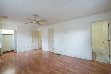 This 3 bedroom, 2.5 bath two-story home with a fireplace is the on Myrtlewood Golf Course and Club  in South Carolina - for sale on GolfHomes.com, golf home, golf lot