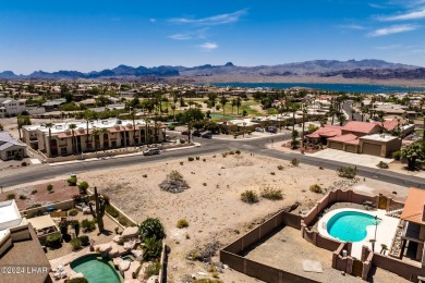 This remarkable corner lot boasts a captivating view of a on London Bridge Golf Course in Arizona - for sale on GolfHomes.com, golf home, golf lot