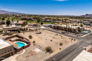 This remarkable corner lot boasts a captivating view of a on London Bridge Golf Course in Arizona - for sale on GolfHomes.com, golf home, golf lot