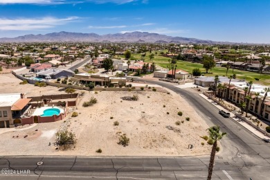 This remarkable corner lot boasts a captivating view of a on London Bridge Golf Course in Arizona - for sale on GolfHomes.com, golf home, golf lot