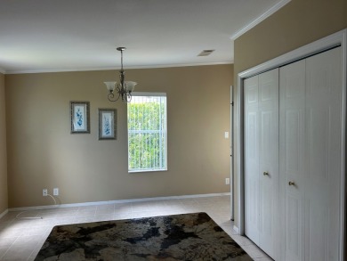 GORGEOUS OPEN AND SPLIT FLOOR PLAN HOME WITH TRAY CEILINGS AND on Silver Dollar Golf and Trap Club in Florida - for sale on GolfHomes.com, golf home, golf lot