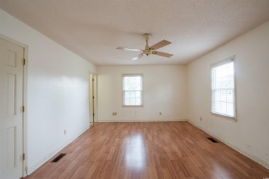 This 3 bedroom, 2.5 bath two-story home with a fireplace is the on Myrtlewood Golf Course and Club  in South Carolina - for sale on GolfHomes.com, golf home, golf lot