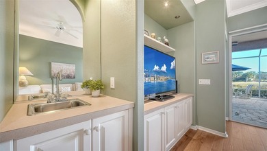 This impeccably maintained villa in Stoneybrook Golf and Country on Stoneybrook Golf and Country Club of Sarasota in Florida - for sale on GolfHomes.com, golf home, golf lot