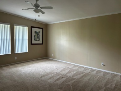 GORGEOUS OPEN AND SPLIT FLOOR PLAN HOME WITH TRAY CEILINGS AND on Silver Dollar Golf and Trap Club in Florida - for sale on GolfHomes.com, golf home, golf lot