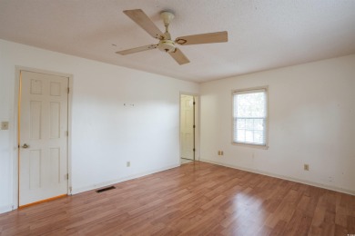 This 3 bedroom, 2.5 bath two-story home with a fireplace is the on Myrtlewood Golf Course and Club  in South Carolina - for sale on GolfHomes.com, golf home, golf lot