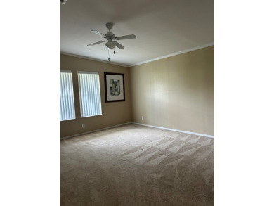 GORGEOUS OPEN AND SPLIT FLOOR PLAN HOME WITH TRAY CEILINGS AND on Silver Dollar Golf and Trap Club in Florida - for sale on GolfHomes.com, golf home, golf lot