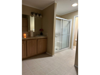 GORGEOUS OPEN AND SPLIT FLOOR PLAN HOME WITH TRAY CEILINGS AND on Silver Dollar Golf and Trap Club in Florida - for sale on GolfHomes.com, golf home, golf lot