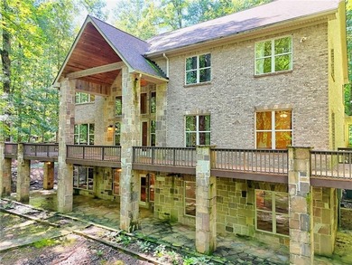 Welcome to this magnificent custom mountain lodge home on 10.54 on Waterfall Country Club in Georgia - for sale on GolfHomes.com, golf home, golf lot