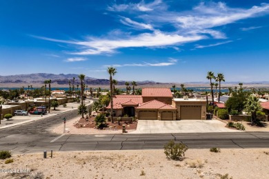 This remarkable corner lot boasts a captivating view of a on London Bridge Golf Course in Arizona - for sale on GolfHomes.com, golf home, golf lot