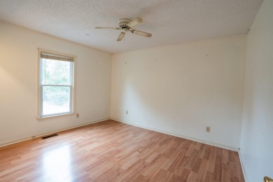 This 3 bedroom, 2.5 bath two-story home with a fireplace is the on Myrtlewood Golf Course and Club  in South Carolina - for sale on GolfHomes.com, golf home, golf lot