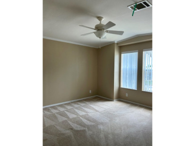 GORGEOUS OPEN AND SPLIT FLOOR PLAN HOME WITH TRAY CEILINGS AND on Silver Dollar Golf and Trap Club in Florida - for sale on GolfHomes.com, golf home, golf lot