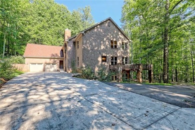 Welcome to this magnificent custom mountain lodge home on 10.54 on Waterfall Country Club in Georgia - for sale on GolfHomes.com, golf home, golf lot