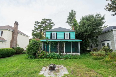 This 3 bedroom, 2.5 bath two-story home with a fireplace is the on Myrtlewood Golf Course and Club  in South Carolina - for sale on GolfHomes.com, golf home, golf lot