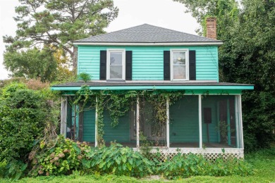 This 3 bedroom, 2.5 bath two-story home with a fireplace is the on Myrtlewood Golf Course and Club  in South Carolina - for sale on GolfHomes.com, golf home, golf lot