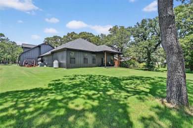 Welcome home! This 18 month old home is move-in ready! The on Lake Kiowa Golf Course in Texas - for sale on GolfHomes.com, golf home, golf lot