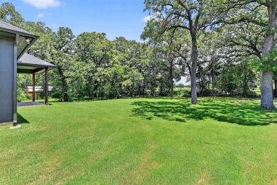 Welcome home! This 18 month old home is move-in ready! The on Lake Kiowa Golf Course in Texas - for sale on GolfHomes.com, golf home, golf lot