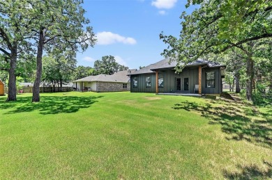 Welcome home! This 18 month old home is move-in ready! The on Lake Kiowa Golf Course in Texas - for sale on GolfHomes.com, golf home, golf lot