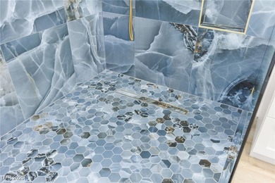 This stunning 2-bedroom, 2-bath, 2,161 sq. ft. home on the 11th on Highland Falls Golf Club in Nevada - for sale on GolfHomes.com, golf home, golf lot