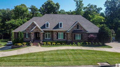 This residence is nestled on a secluded street with golf cart on Country Club of Paducah in Kentucky - for sale on GolfHomes.com, golf home, golf lot