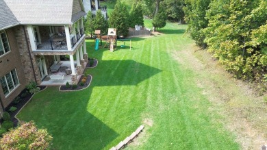 This residence is nestled on a secluded street with golf cart on Country Club of Paducah in Kentucky - for sale on GolfHomes.com, golf home, golf lot