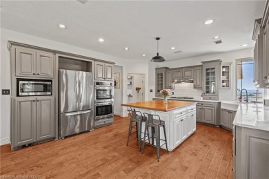 Welcome to this stunning 4-bedroom, 3.5-bathroom home nestled on on Eagle Crest Golf Course in Arkansas - for sale on GolfHomes.com, golf home, golf lot